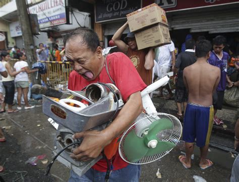 looted pjnay|Filipinos in typhoon.
